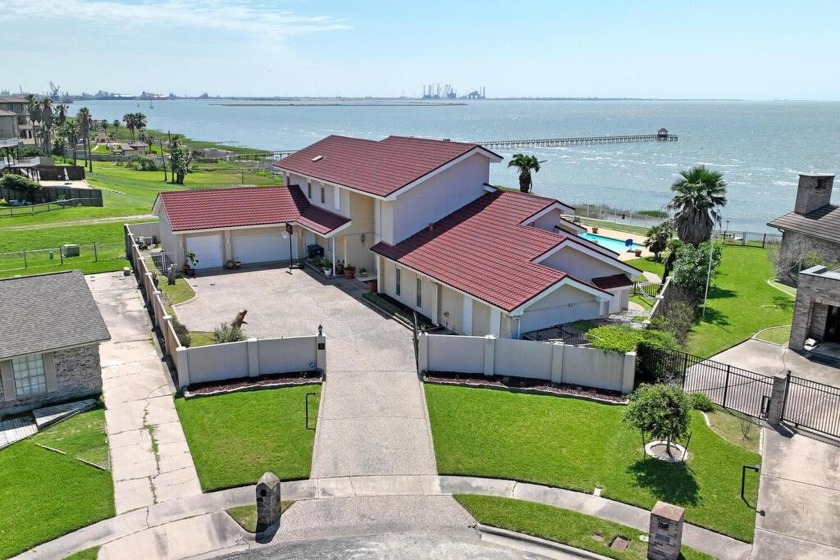 An exquisite waterfront home with breathtaking views, located on - Beach Home for sale in Portland, Texas on Beachhouse.com