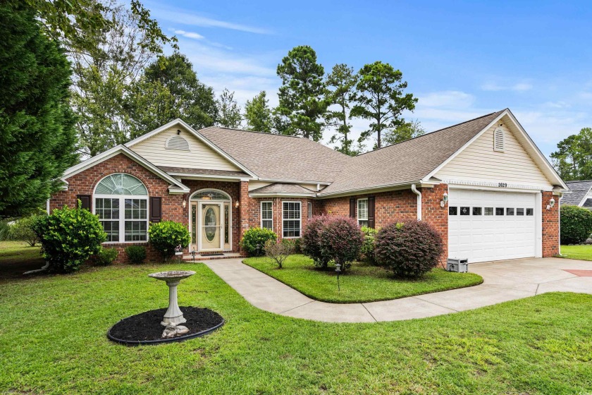 This exceptional three-bedroom, two-bath home is situated on a - Beach Home for sale in Longs, South Carolina on Beachhouse.com