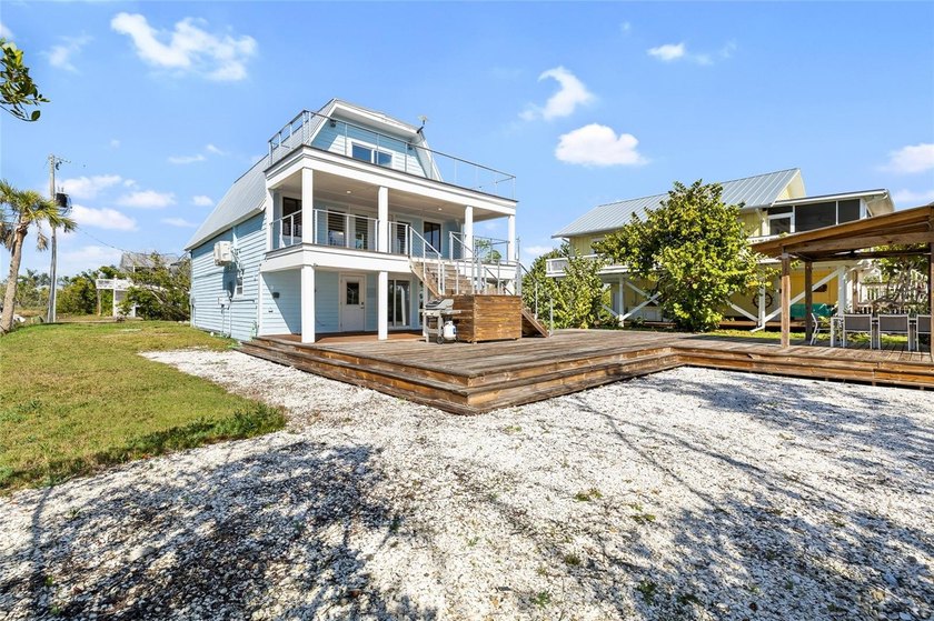 Bayside living at its finest! This beautifully appointed - Beach Home for sale in Placida, Florida on Beachhouse.com