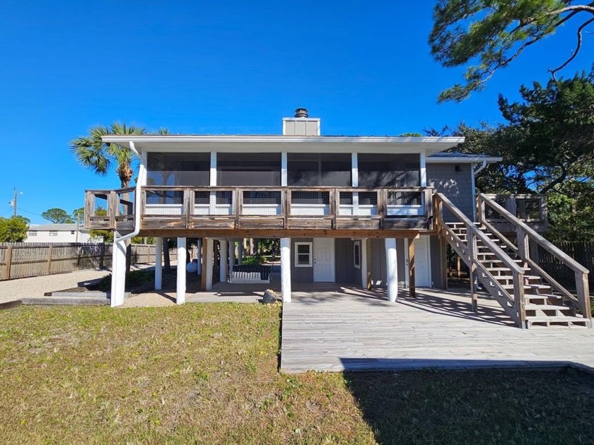 Canal front 2 bedroom cottage with a deep water dock. Welcome to - Beach Home for sale in St. George Island, Florida on Beachhouse.com