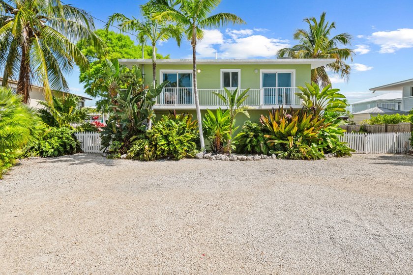 Fantastic oceanside canal home offering peek-a-boo ocean views - Beach Home for sale in Plantation Key, Florida on Beachhouse.com