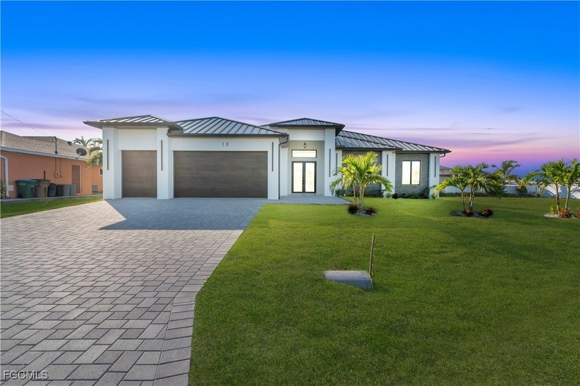 Discover luxury Florida living in this brand-new 2025 custom - Beach Home for sale in Cape Coral, Florida on Beachhouse.com