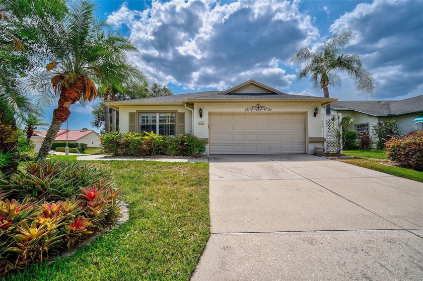 Located in The Greens of Peridia, this 1,756 Sq. Ft. home offers - Beach Home for sale in Bradenton, Florida on Beachhouse.com