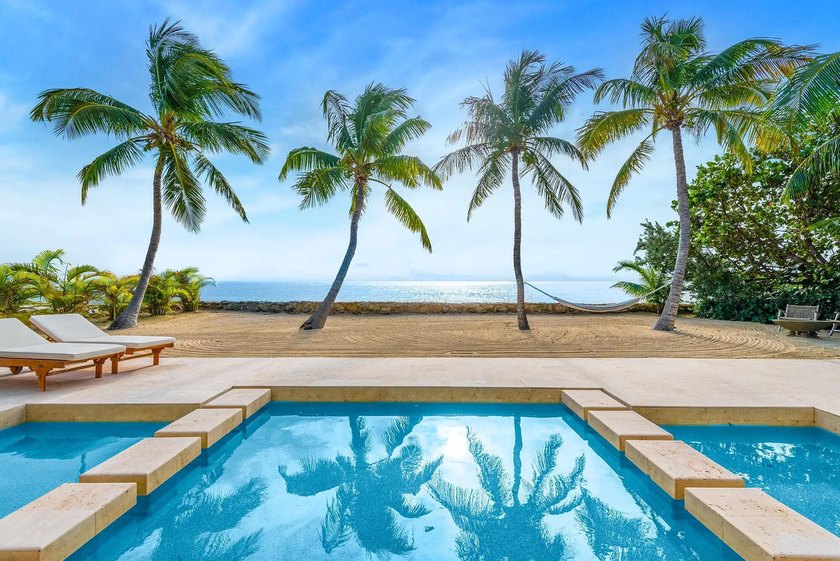 A rare uninterrupted view, luxury oceanfront estate where - Beach Home for sale in Key Largo, Florida on Beachhouse.com
