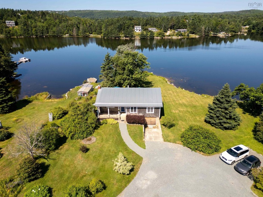 Nestled on the serene, sheltered waters of Whynacht's Cove, this - Beach Home for sale in Upper Tantallon,  on Beachhouse.com