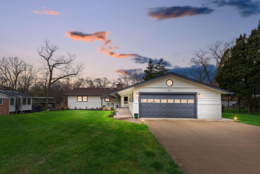 Step into this luxuriously revitalized Long Beach hillside ranch - Beach Home for sale in Long Beach, Indiana on Beachhouse.com