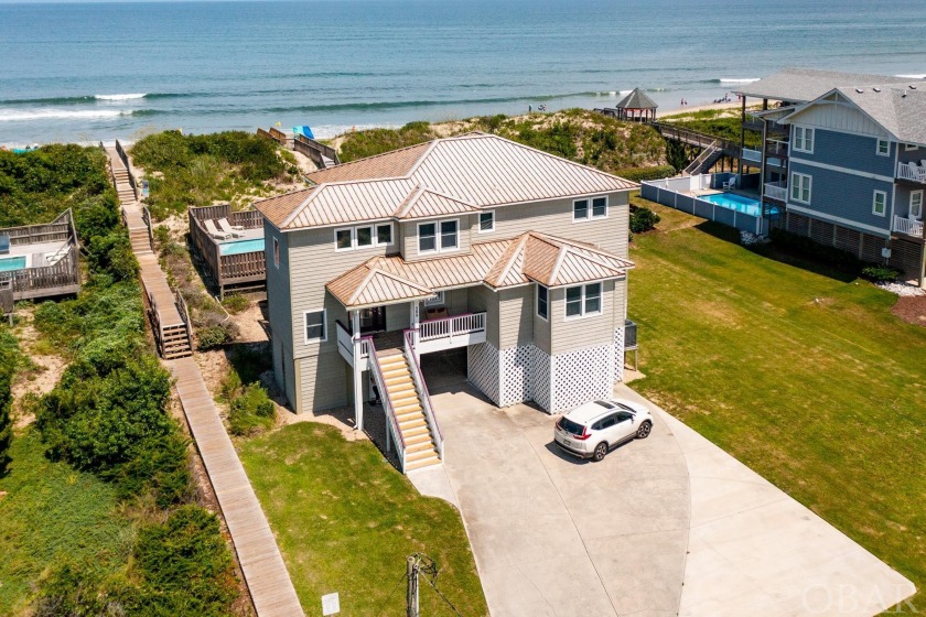 Renters love this nicely maintained 5BR oceanfront house on a - Beach Home for sale in Corolla, North Carolina on Beachhouse.com