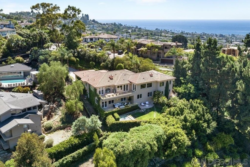 Discover the epitome of luxury living at 6617 Muirlands Dr - Beach Home for sale in La Jolla, California on Beachhouse.com