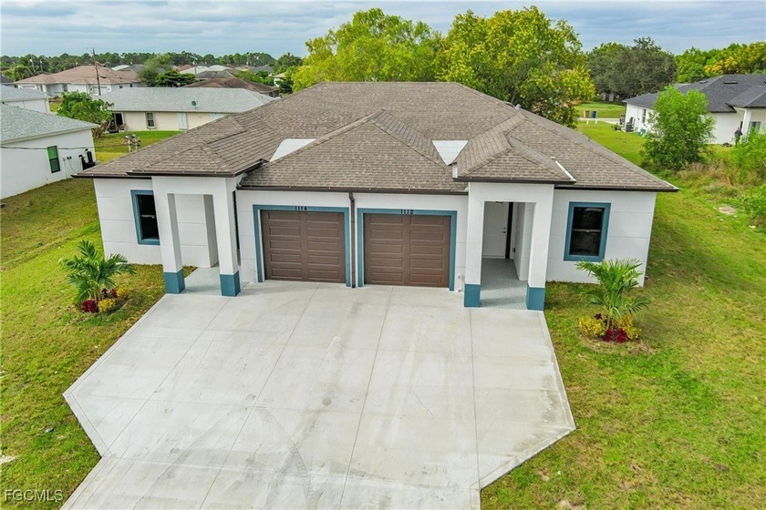 Exceptional new construction duplex offering a prime - Beach Home for sale in Lehigh Acres, Florida on Beachhouse.com