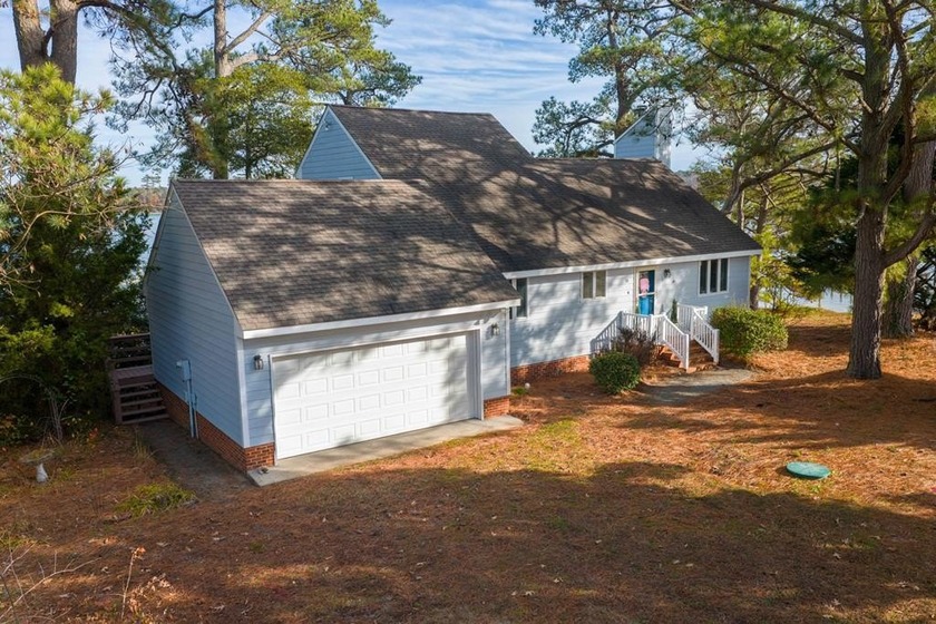 Tucked in the waterfront neighborhood of Heritage Pt. on - Beach Home for sale in Deltaville, Virginia on Beachhouse.com