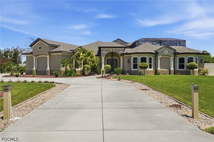 Welcome to an extraordinary custom 4-bedroom, 4.5-bathroom - Beach Home for sale in Lehigh Acres, Florida on Beachhouse.com