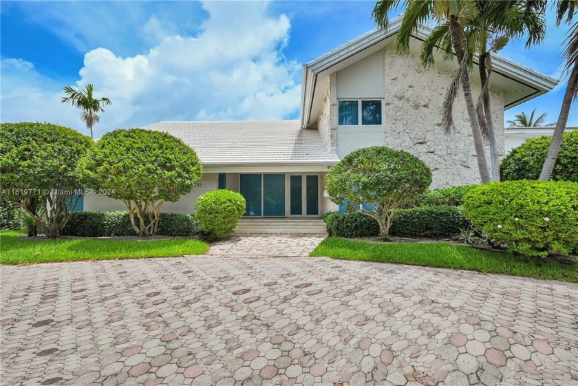 Experience luxury living in this stunning contemporary residence - Beach Home for sale in Bay Harbor Islands, Florida on Beachhouse.com