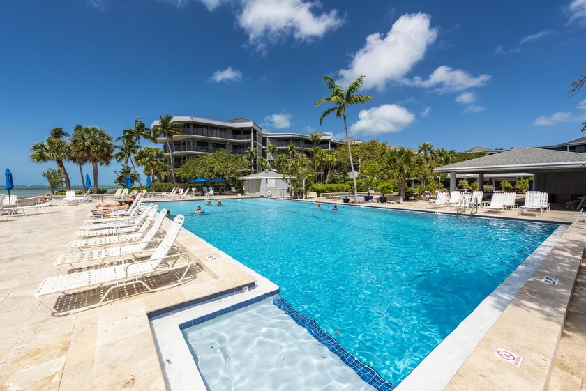 This spacious two-bedroom, two-bath penthouse condo boasts a - Beach Condo for sale in Key West, Florida on Beachhouse.com
