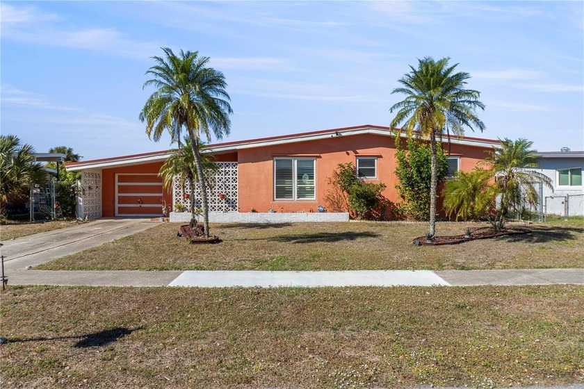 This traditional style Florida homes features a NEW metal roof - Beach Home for sale in Port Charlotte, Florida on Beachhouse.com