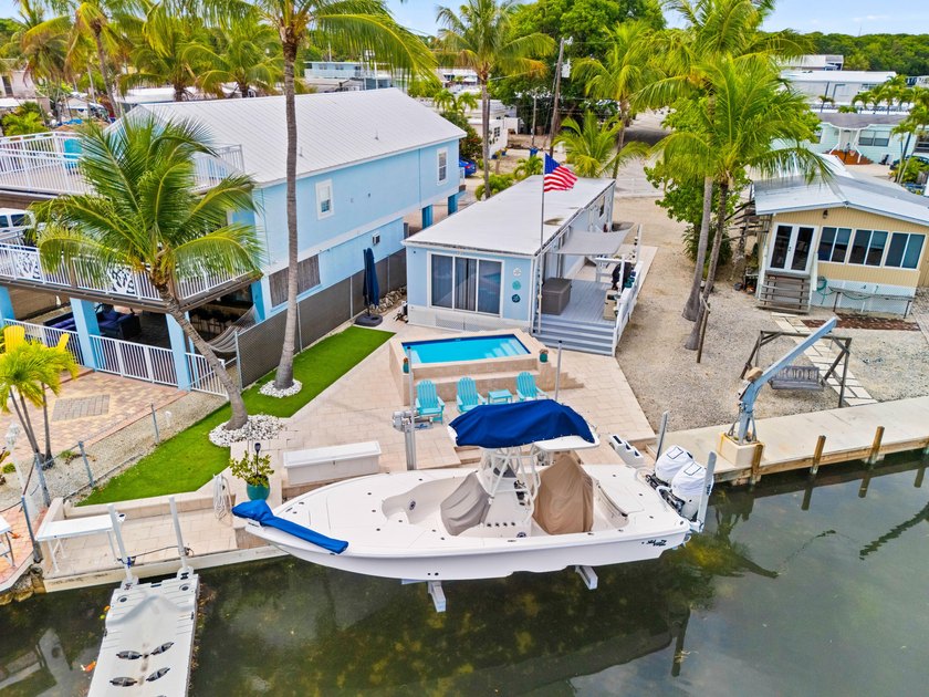 True Florida Keys Living - Set along a wide canal with direct - Beach Home for sale in Key Largo, Florida on Beachhouse.com