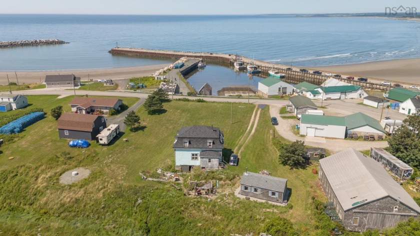 Located at 3258 Main Shore Road in Port Maitland, this 1.3-acre - Beach Home for sale in Port Maitland,  on Beachhouse.com