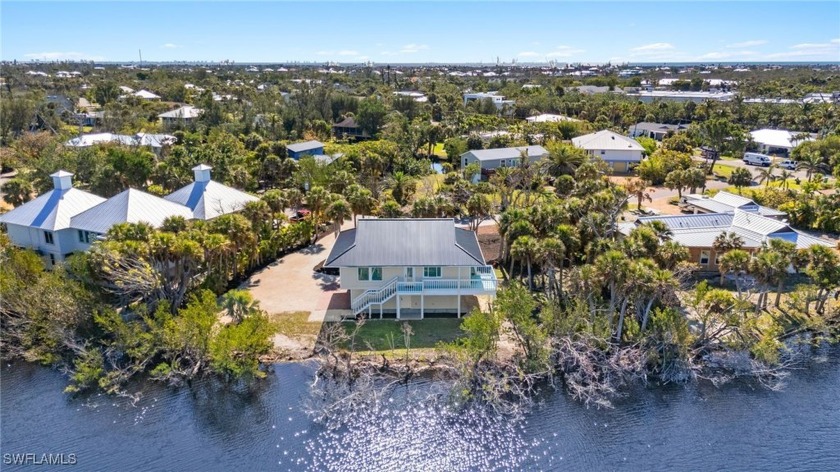 Discover the charm of this beautifully remodeled lakefront home - Beach Home for sale in Sanibel, Florida on Beachhouse.com