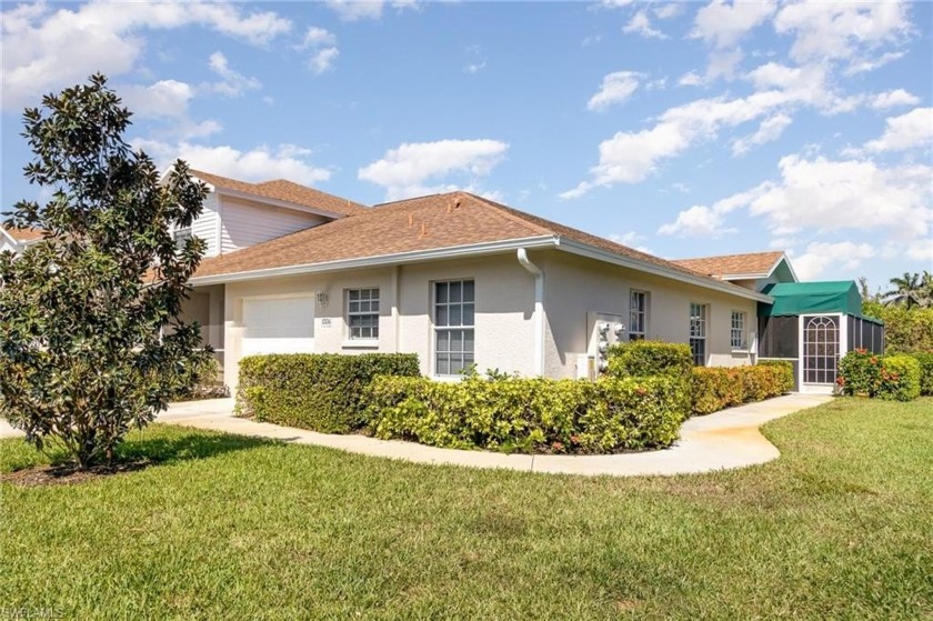 This is a stunning and rare one-story condo that lives like a - Beach Home for sale in Naples, Florida on Beachhouse.com