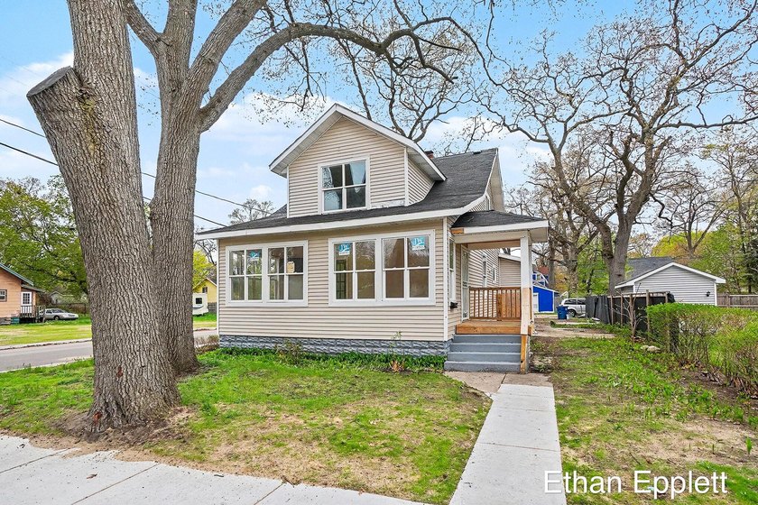 Step into this completely remodeled 4 bedroom gem where every - Beach Home for sale in Muskegon, Michigan on Beachhouse.com