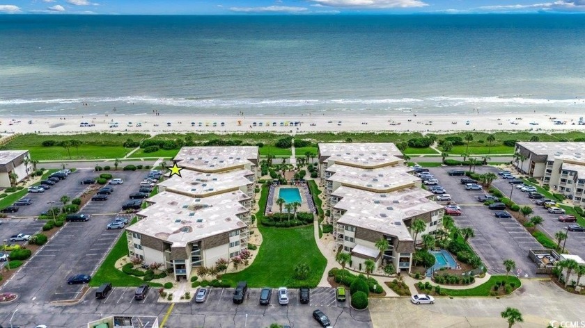 Enjoy ocean views from the balcony of this two-bedroom condo at - Beach Condo for sale in Myrtle Beach, South Carolina on Beachhouse.com