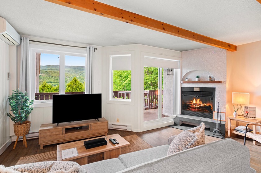 Short-term rental permitted -- Hotel du Lac. Charming - Beach Condo for sale in Mont-Tremblant, QC on Beachhouse.com