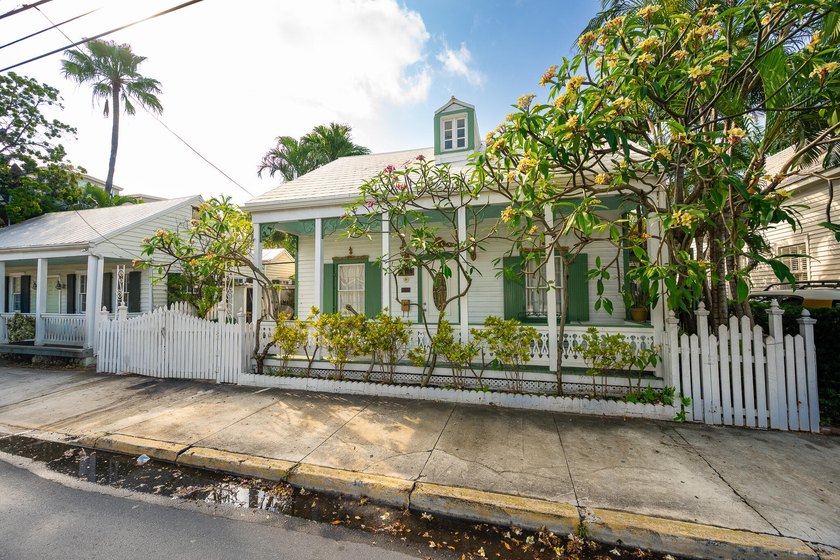 Enjoy watching the world go by from the front porch of 1016 - Beach Home for sale in Key West, Florida on Beachhouse.com