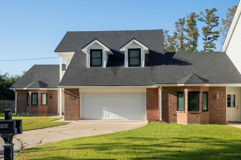 Large luxury townhouse with deck and side lot overlooking the - Beach Home for sale in Houma, Louisiana on Beachhouse.com