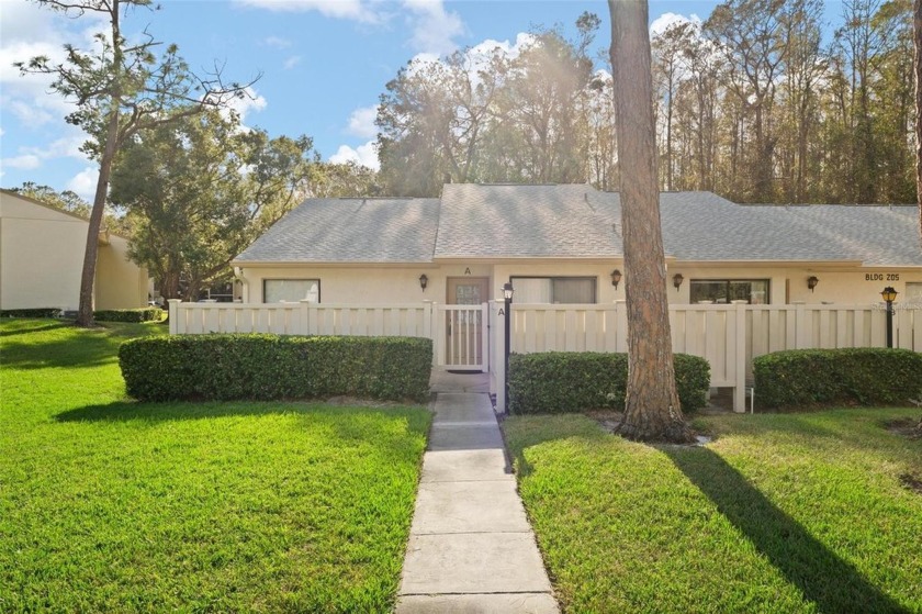 This Lovely end-unit 2-bedroom 2-bath Villa, located in the - Beach Condo for sale in Tarpon Springs, Florida on Beachhouse.com