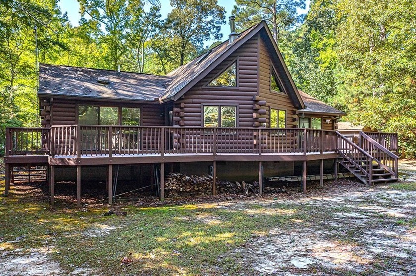 A log-home lover's dream! This beautifully updated log home - Beach Home for sale in Lancaster, Virginia on Beachhouse.com