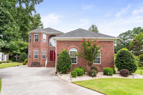 Presenting this stunning 3-bedroom, 3-bath custom-built brick - Beach Home for sale in Longs, South Carolina on Beachhouse.com