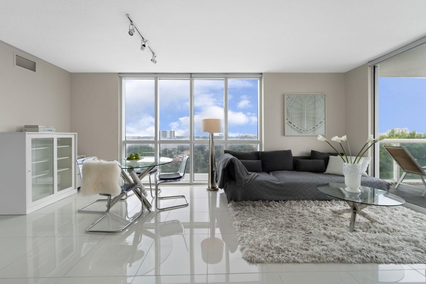 Step into this stunning 2-bed, 2-bath corner unit, where modern - Beach Condo for sale in Miami, Florida on Beachhouse.com