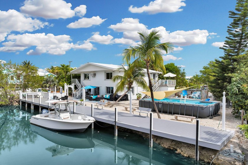 This three bedroom , two bathroom home sits on an expansive 12 - Beach Home for sale in Ramrod Key, Florida on Beachhouse.com