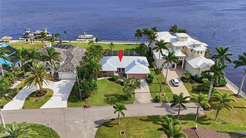 Situated on an impressive 15,000+ sq. ft. riverfront lot in Cape - Beach Home for sale in Cape Coral, Florida on Beachhouse.com