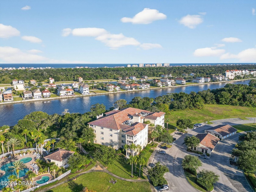 Nestled on the serene ground floor of this exclusive waterfront - Beach Condo for sale in Palm Coast, Florida on Beachhouse.com