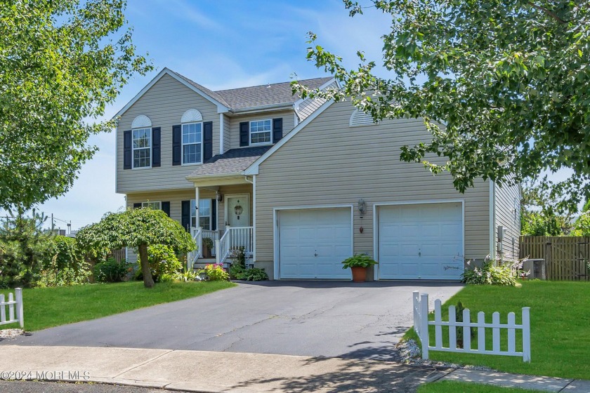 Nestled on a cul-de-sac two blocks from Shark River, this - Beach Home for sale in Neptune, New Jersey on Beachhouse.com