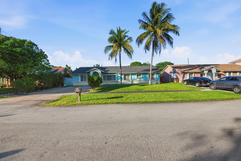 Discover this charming 4-bedroom, 2-bath single-family home in - Beach Home for sale in Deerfield Beach, Florida on Beachhouse.com