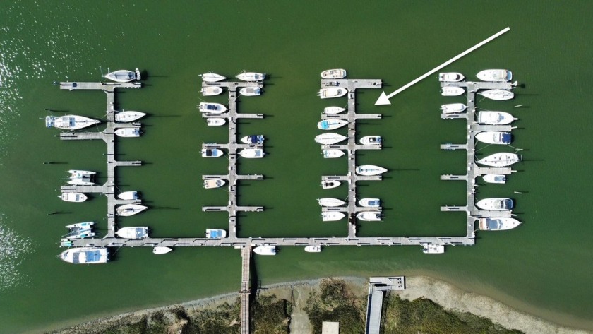 Nestled along the scenic Folly River, this private, gated marina - Beach Lot for sale in Folly Beach, South Carolina on Beachhouse.com