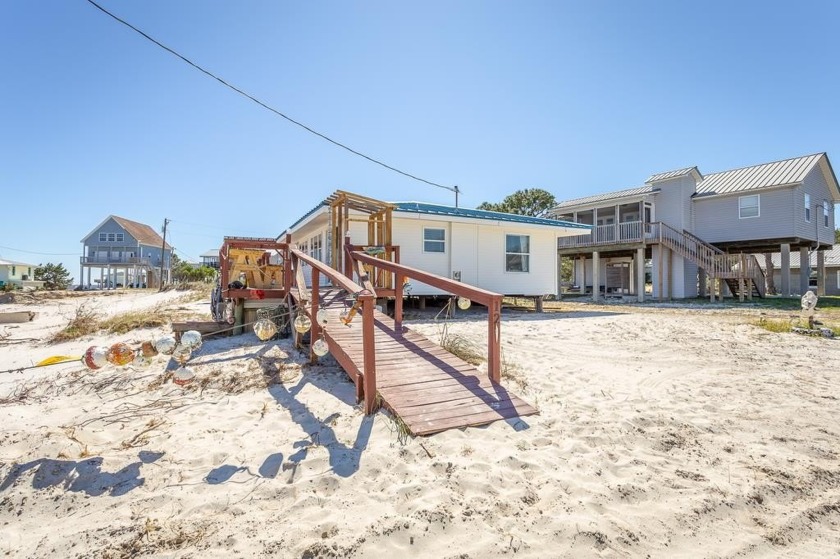 *Motivated Seller* Don't miss this charming coastal cottage with - Beach Home for sale in Alligator Point, Florida on Beachhouse.com