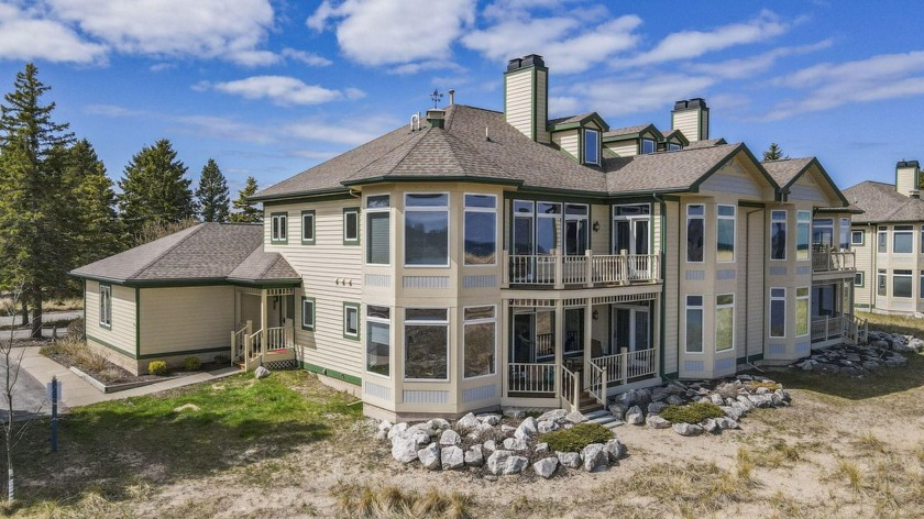 Panoramic Pure Michigan views are available looking up the Lake - Beach Condo for sale in Manistee, Michigan on Beachhouse.com