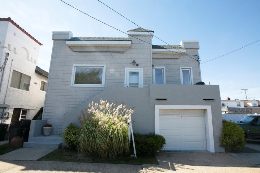 Beach House with private Beach this home sits on a large piece - Beach Home for sale in Lido Beach, New York on Beachhouse.com