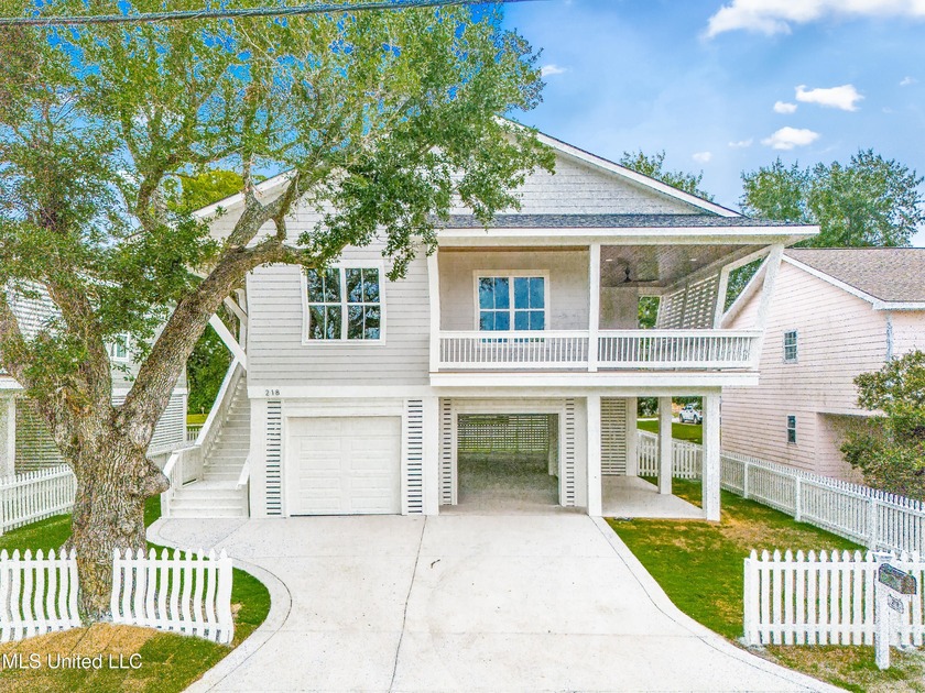 Imagine parking the golf cart after a sun-soaked morning at the - Beach Home for sale in Pass Christian, Mississippi on Beachhouse.com