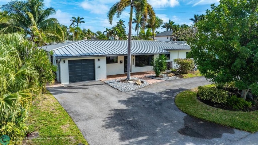 Sought after Lake Placid!  This 4 bedroom 3 bath home is just 4 - Beach Home for sale in Lighthouse Point, Florida on Beachhouse.com