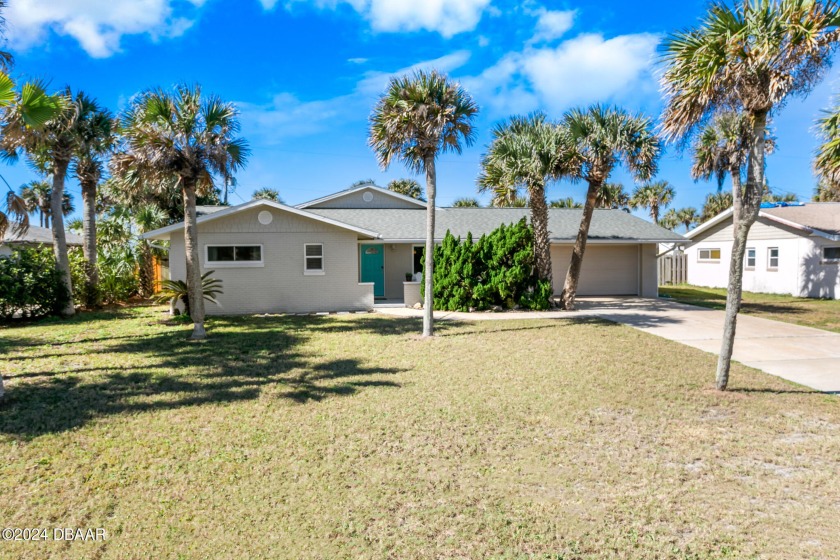 BEAUTIFULLY UPDATED 3 BEDROOM 2 BATH SCREENED POOL HOME LOCATED - Beach Home for sale in Ponce Inlet, Florida on Beachhouse.com