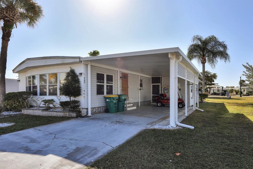 Enjoy relaxed Florida living in this 1978 home nestled inside a - Beach Home for sale in Port Charlotte, Florida on Beachhouse.com