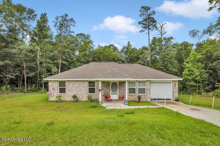 This 3 bed, 2 bath home built in 2023 is just a baby which means - Beach Home for sale in Diamondhead, Mississippi on Beachhouse.com