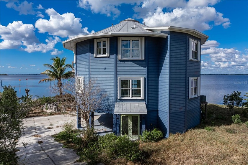 ICONIC PEACE RIVER WATERFRONT - ONE-OF-A-KIND HOME WITH - Beach Home for sale in Punta Gorda, Florida on Beachhouse.com