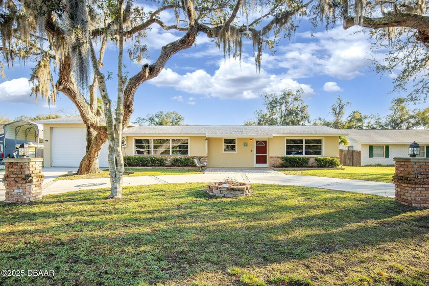 Spacious Pool Home with Oversized Garage & Expansive Yard in - Beach Home for sale in Ormond Beach, Florida on Beachhouse.com