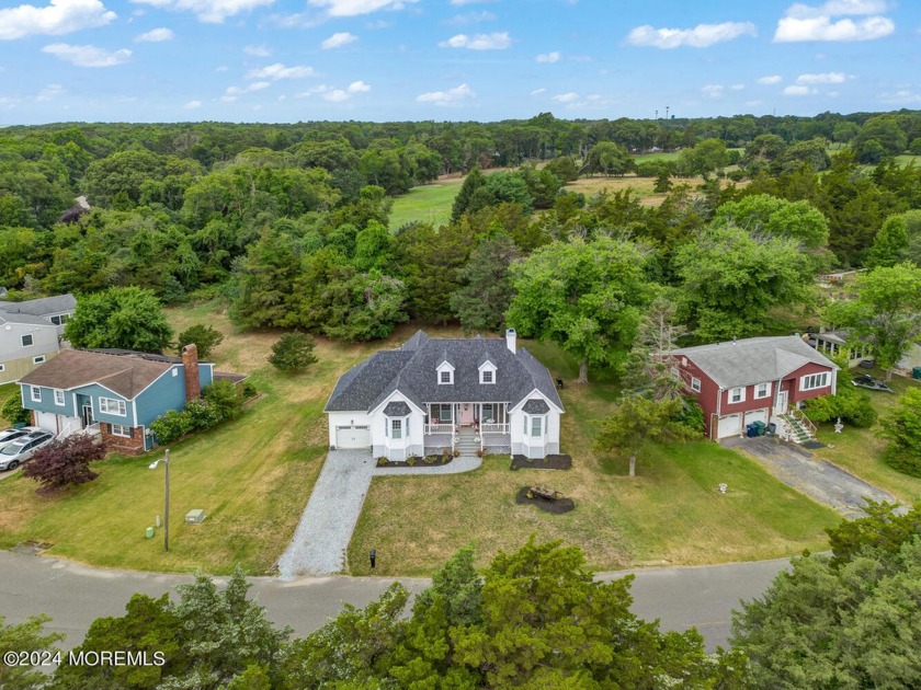 Welcome to this stunning Cape-style home, built in 2018, located - Beach Home for sale in Little Egg Harbor, New Jersey on Beachhouse.com