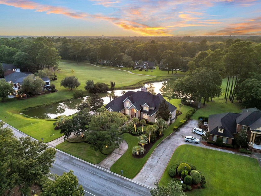 Situated on a beautiful pond-front lot overlooking the golf - Beach Home for sale in North Charleston, South Carolina on Beachhouse.com