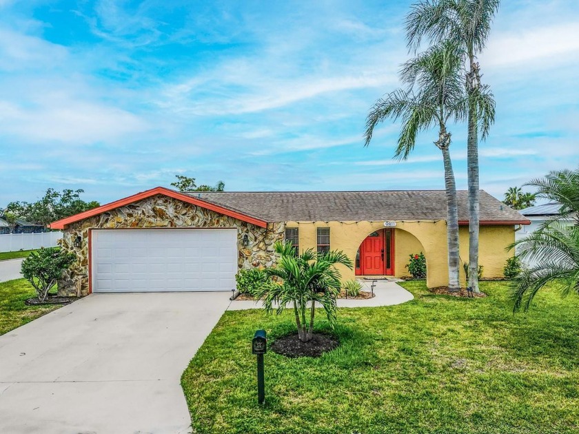 MOTIVATED !! 3/2/2 WATERFRONT POOL HOME !! 100 FEET OF SEAWALL - Beach Home for sale in Port Richey, Florida on Beachhouse.com